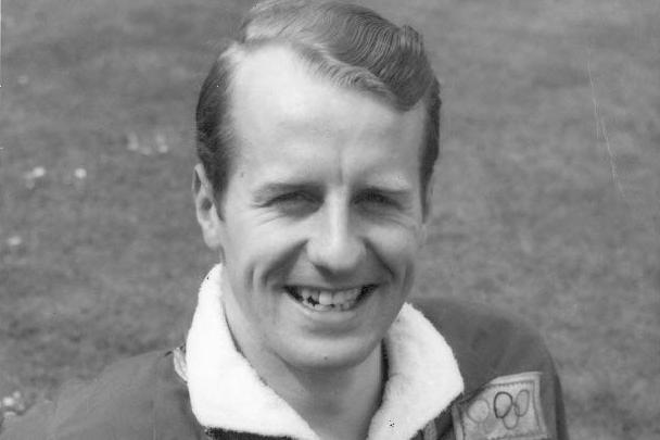 A black and white photo of a man, David Jones, wearing the Rome 1960 Oympic Kit