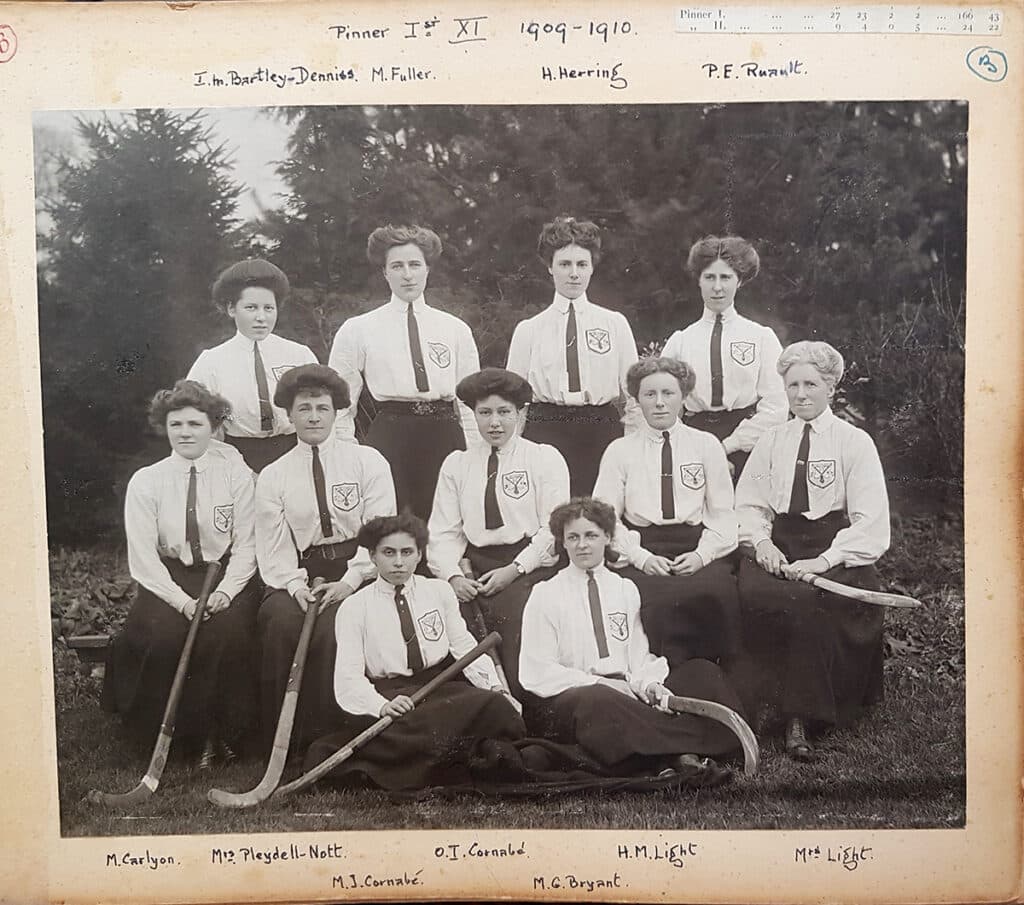 A black and white image of a women's hockey team