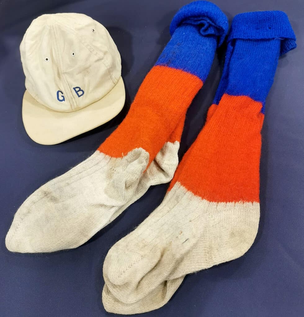 The playing socks and cap of Dr John Bell. 