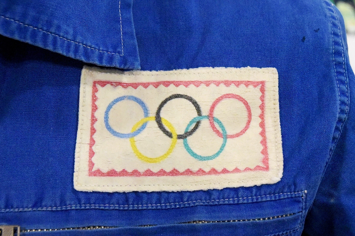 An image of the detail on the Great Britain team recreational jacket with Olympic Rings cloth badge.