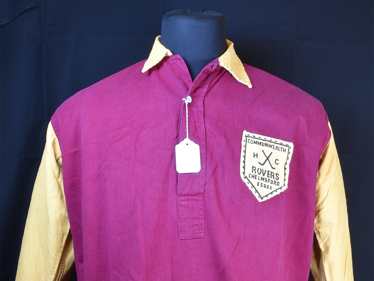 A picture of a men’s maroon and gold Umbro hockey shirt