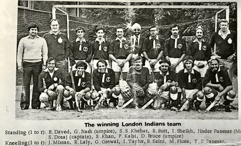 A black and white image of the London Indians hockey team after winning their own 21st anniversary tournament in 1979.