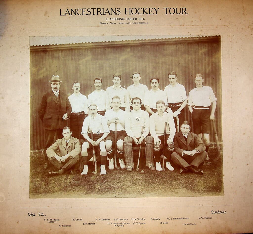 A black and white photo of a mens hockey team