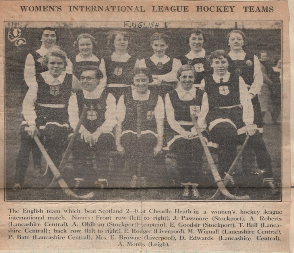 A black and white image of a women's hockey team