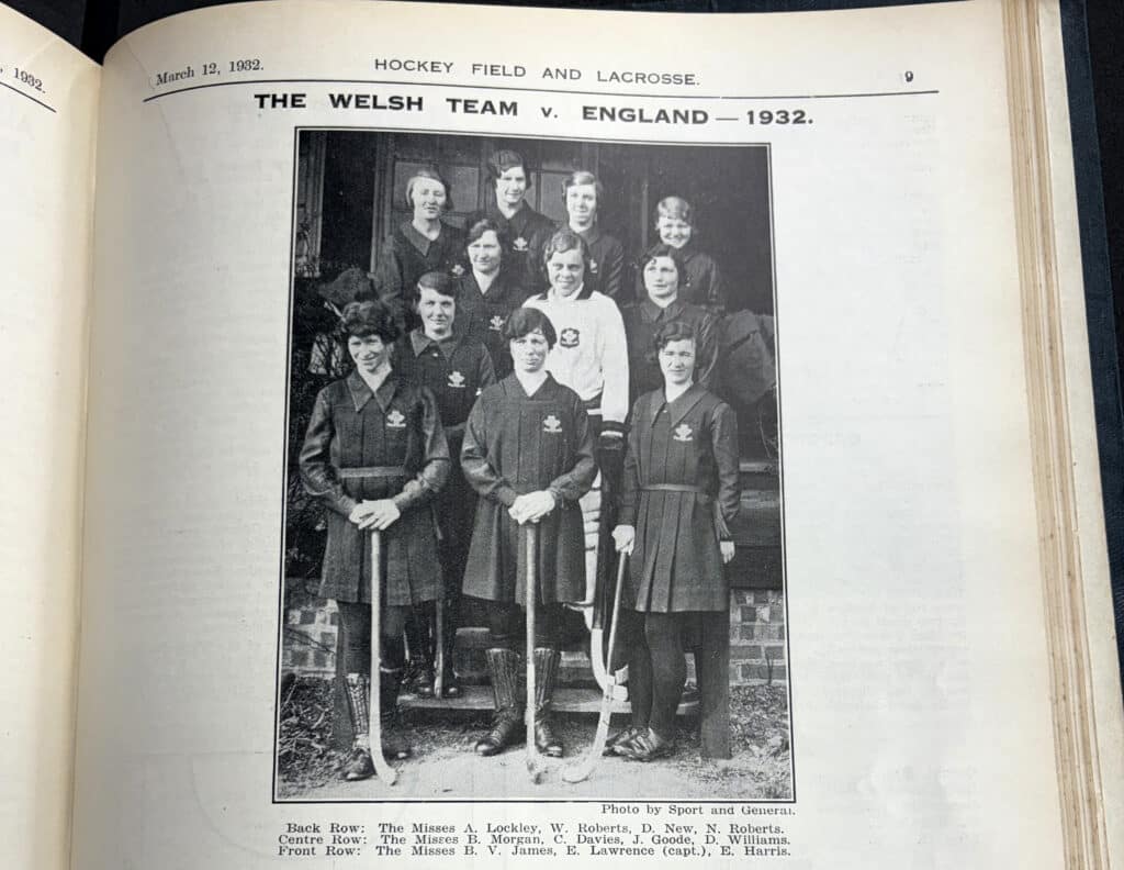 A black and white image of a female hockey team