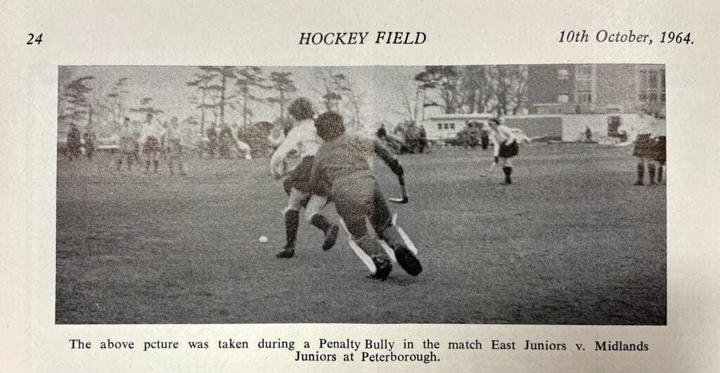 A black and white picture of a women's hockey game