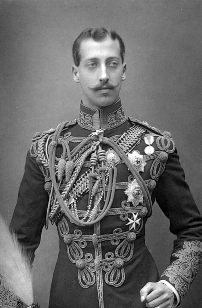 A black and white image of a young prince in royal clothes