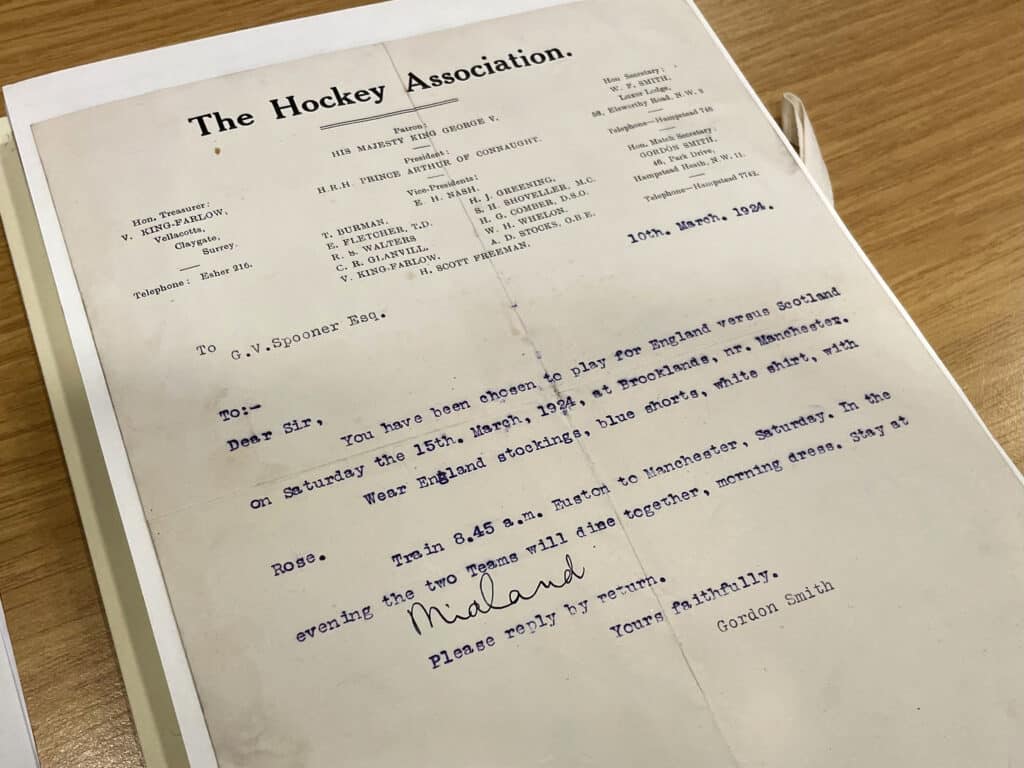 A typed letter of invitation to Garnet Spooner to play for England. The typed font is blue on white headed paper.