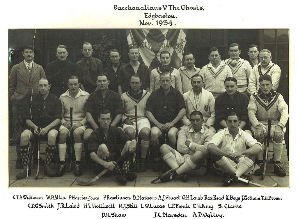 Black and white group photograph of two men's hockey teams standing or seated in three rows. Players are wearing buttoned-up shirts, sweaters or blazers.