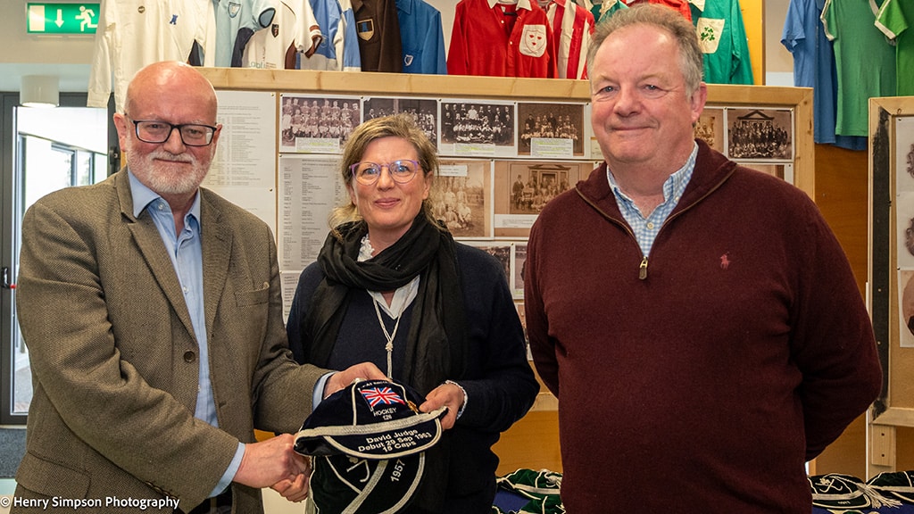 A woman is presented with a cap