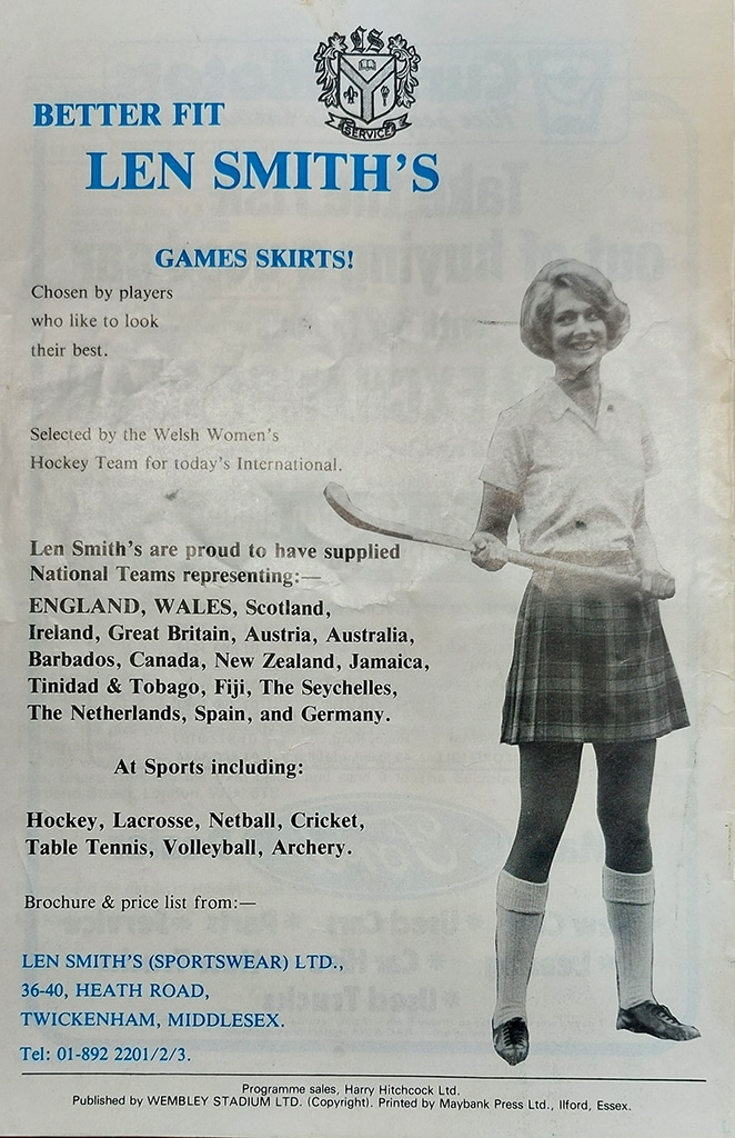 A full-page advert from a magazine featuring a young woman wearing a tartan skirt and holding a hockey stick.