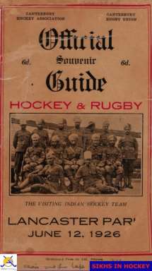 The cover page of an orange-hued match programme with an image of the visiting Indian hockey team.