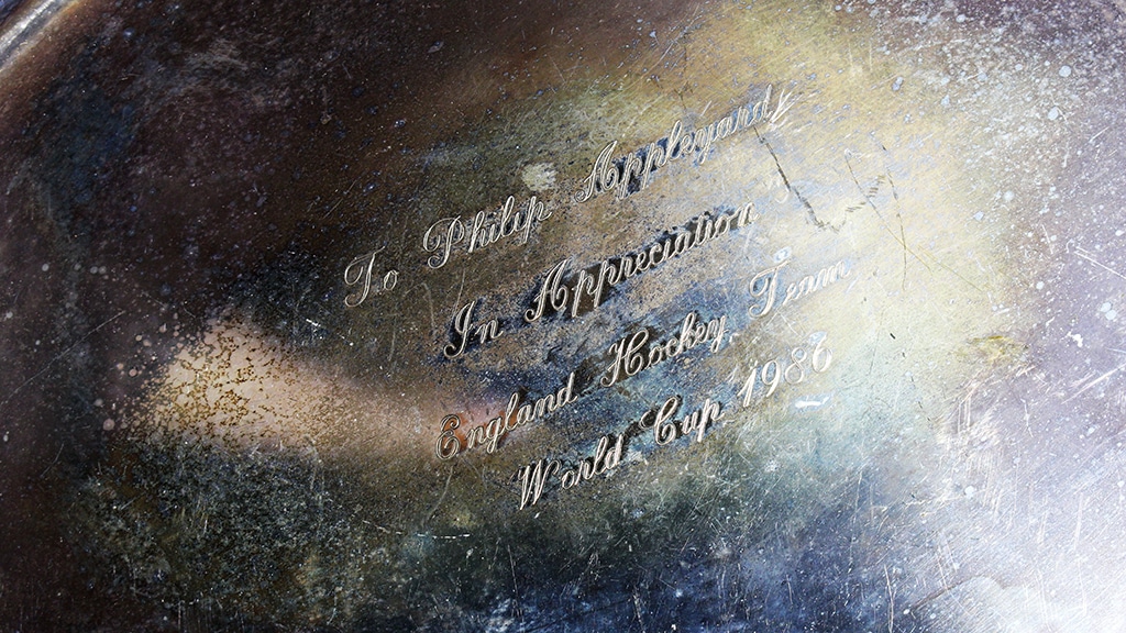 Close-up of the inscription on a silver presentation dish.